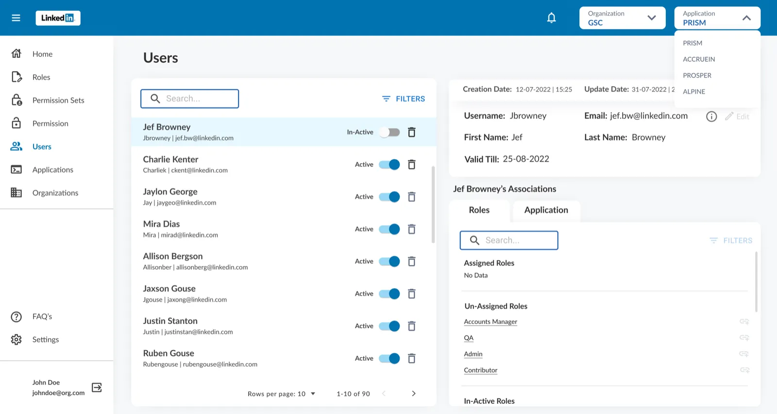 User management — switching between applications from the header, with a user’s assigned roles alongside